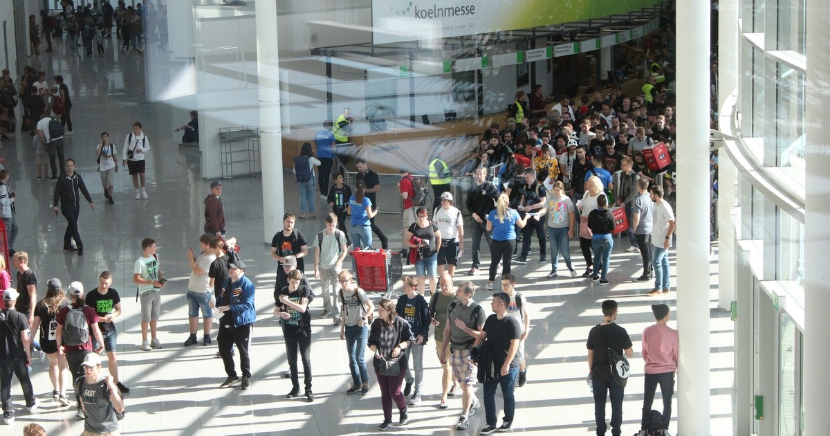 Attendees at Koelnmesse entrance during Gamescom, illustrating German trade fair VAT context